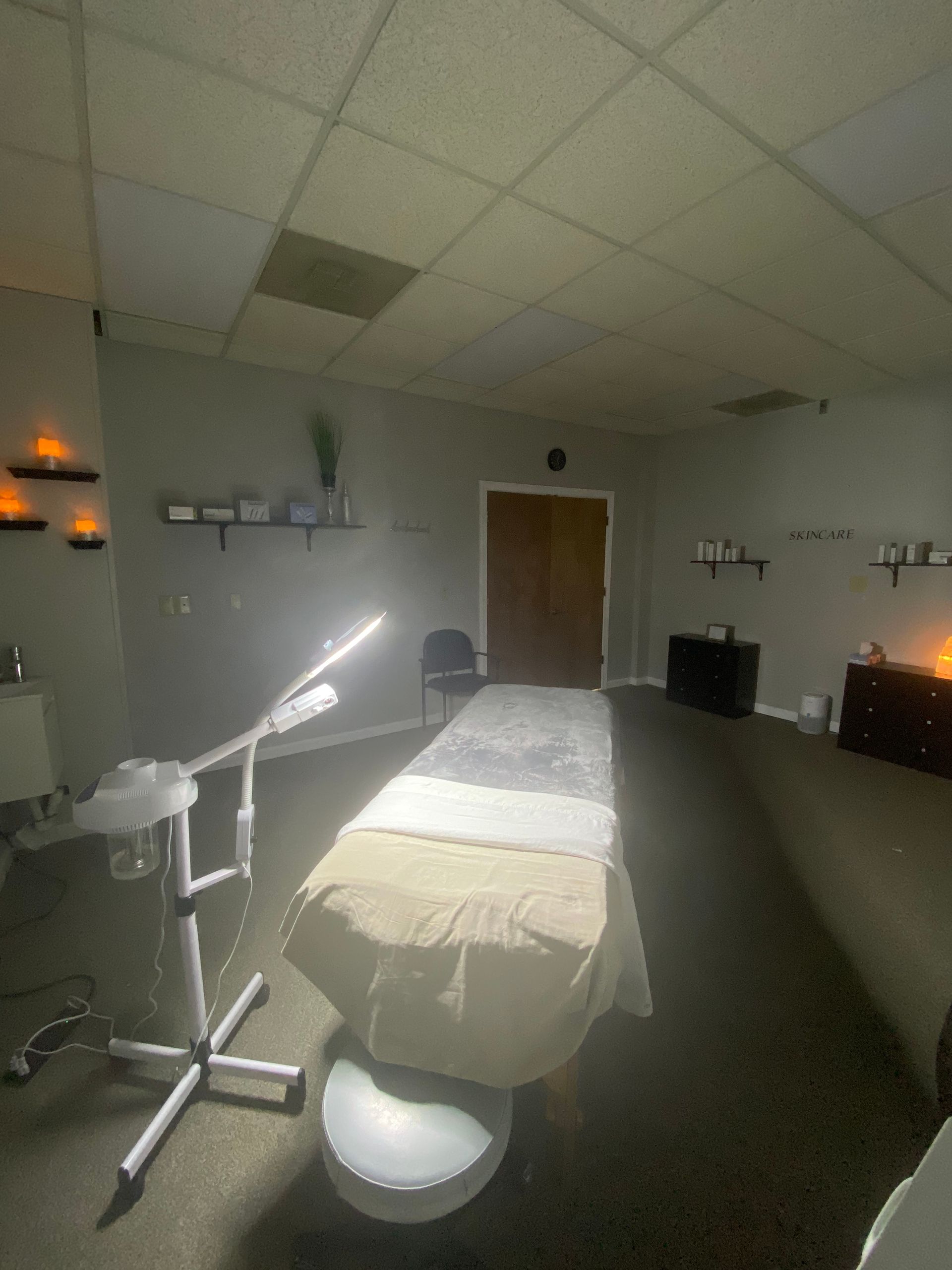 A room with a table and a chair in it