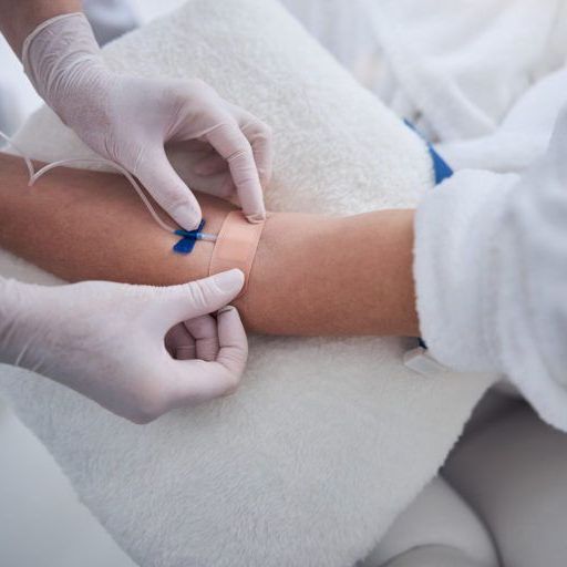 After searching foot detox near me a woman is getting a foot detox at Beauty Bar Med Spa