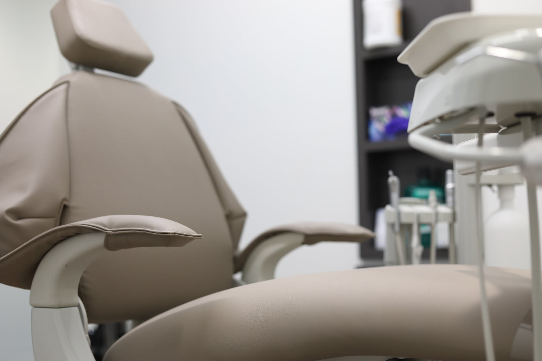 An empty dental chair in a dental office