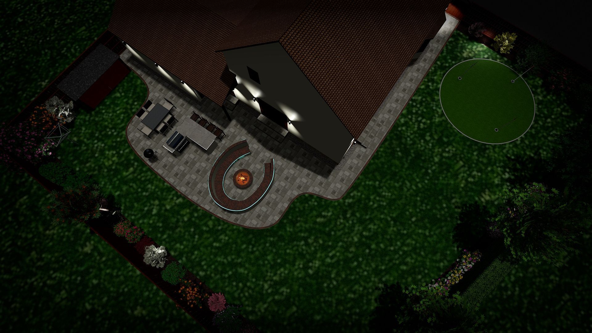 An aerial view of a backyard at night with a fire pit.