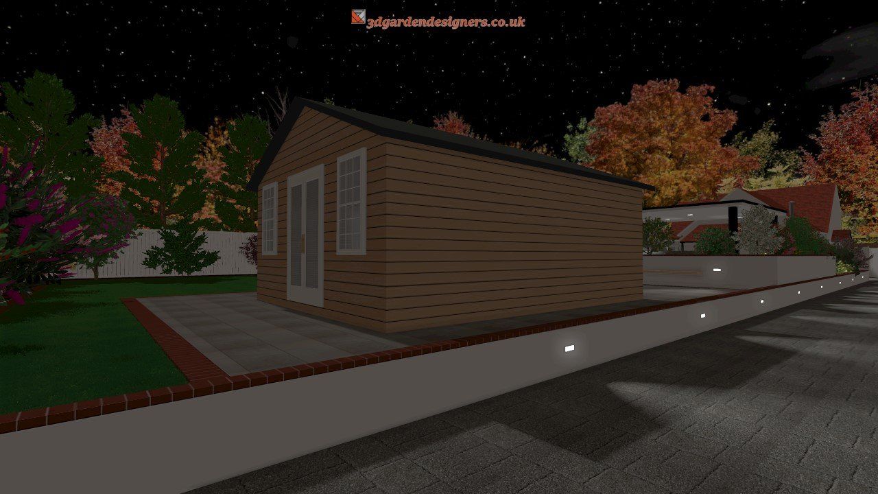 A small brick house is sitting on the side of the road at night.