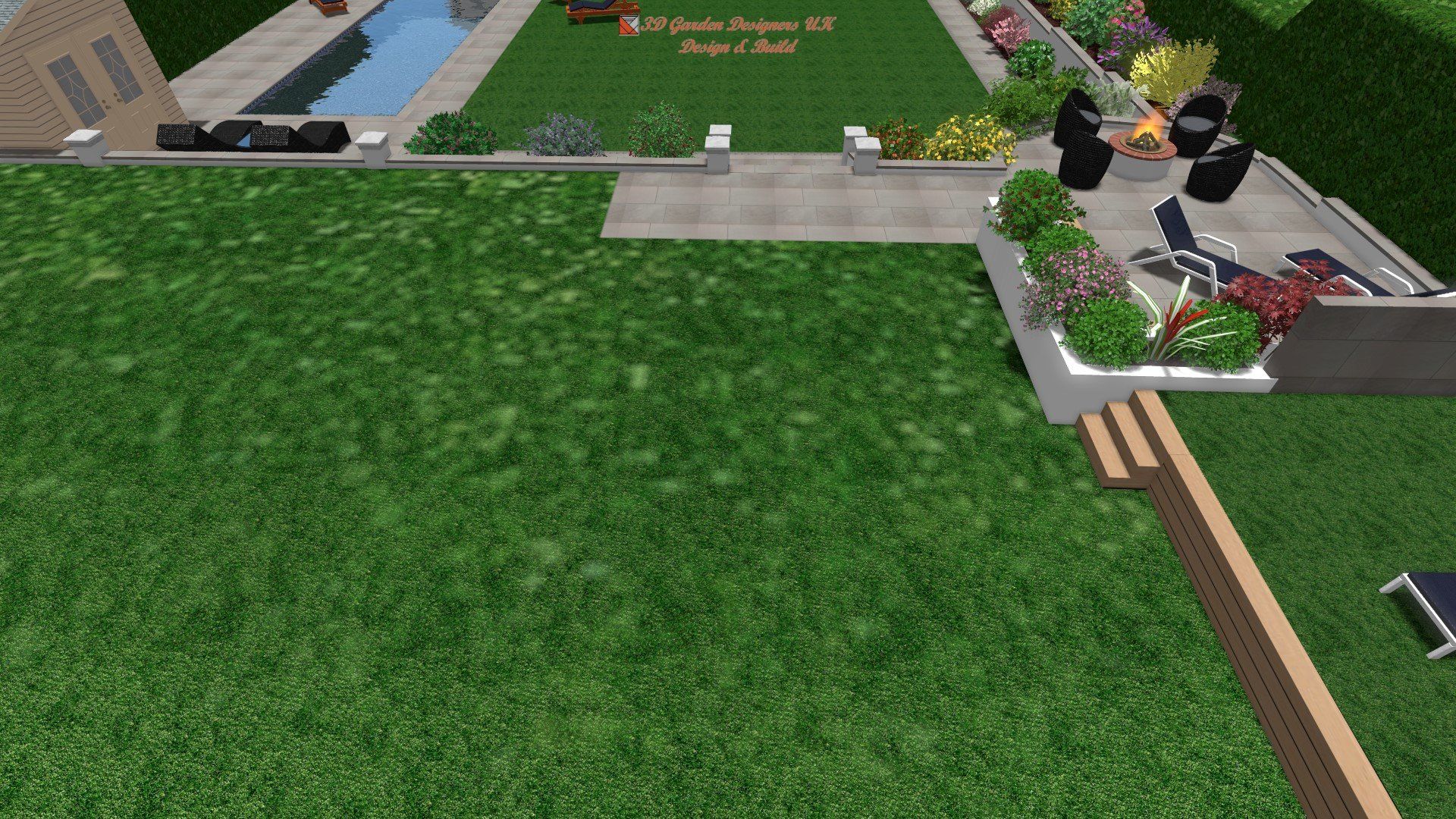 An aerial view of a lush green lawn with a pool in the background.