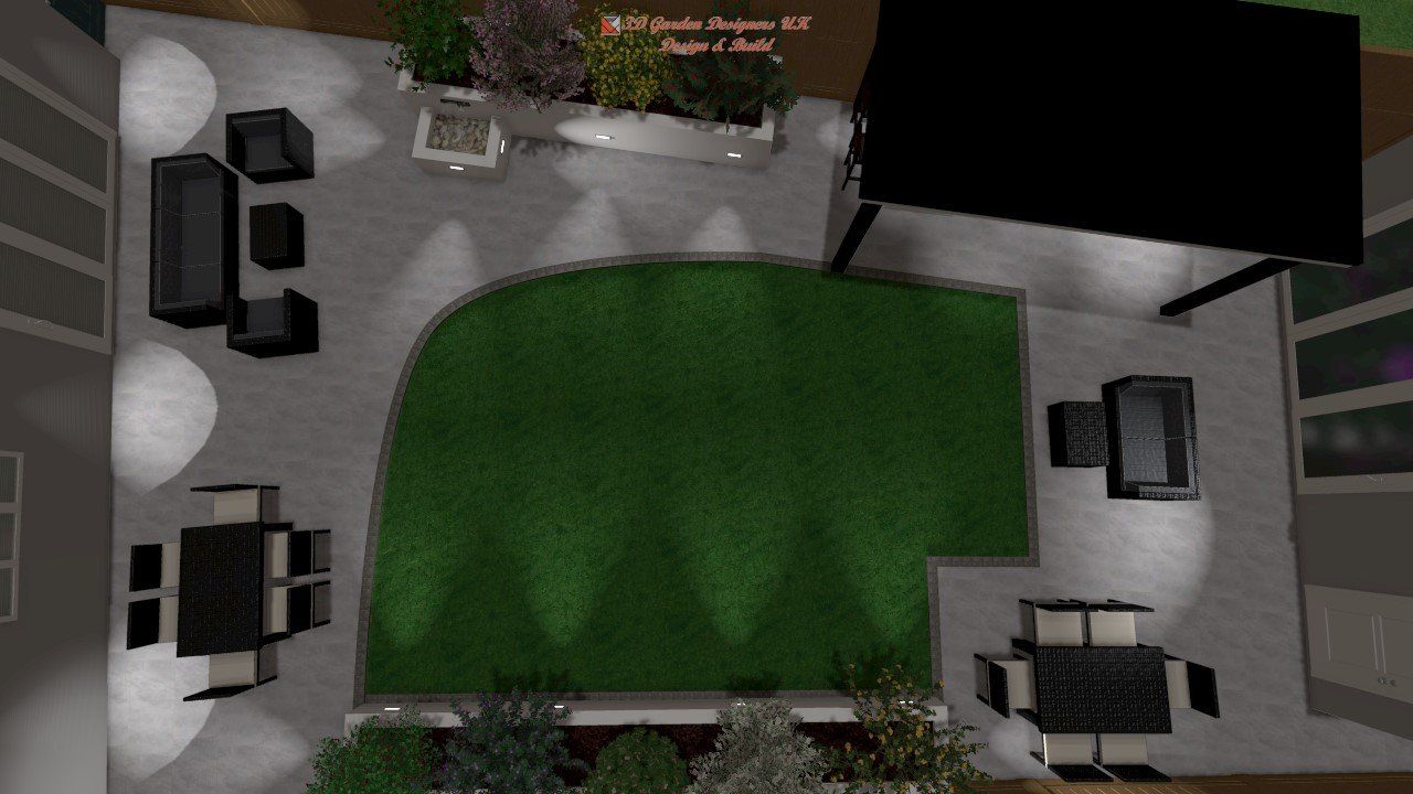 An aerial view of a patio with furniture and a lawn.