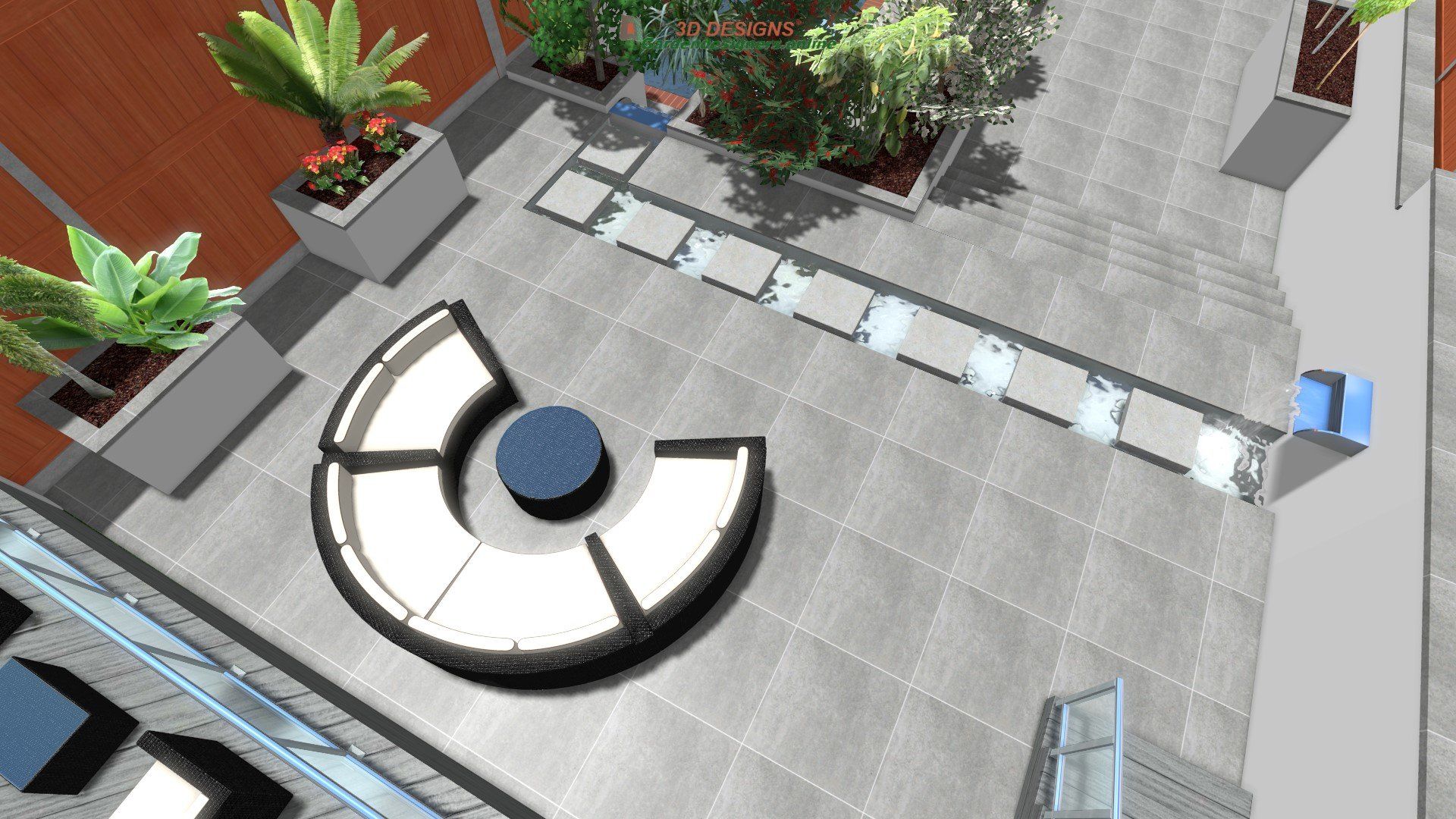 An aerial view of a patio with a round couch and a table