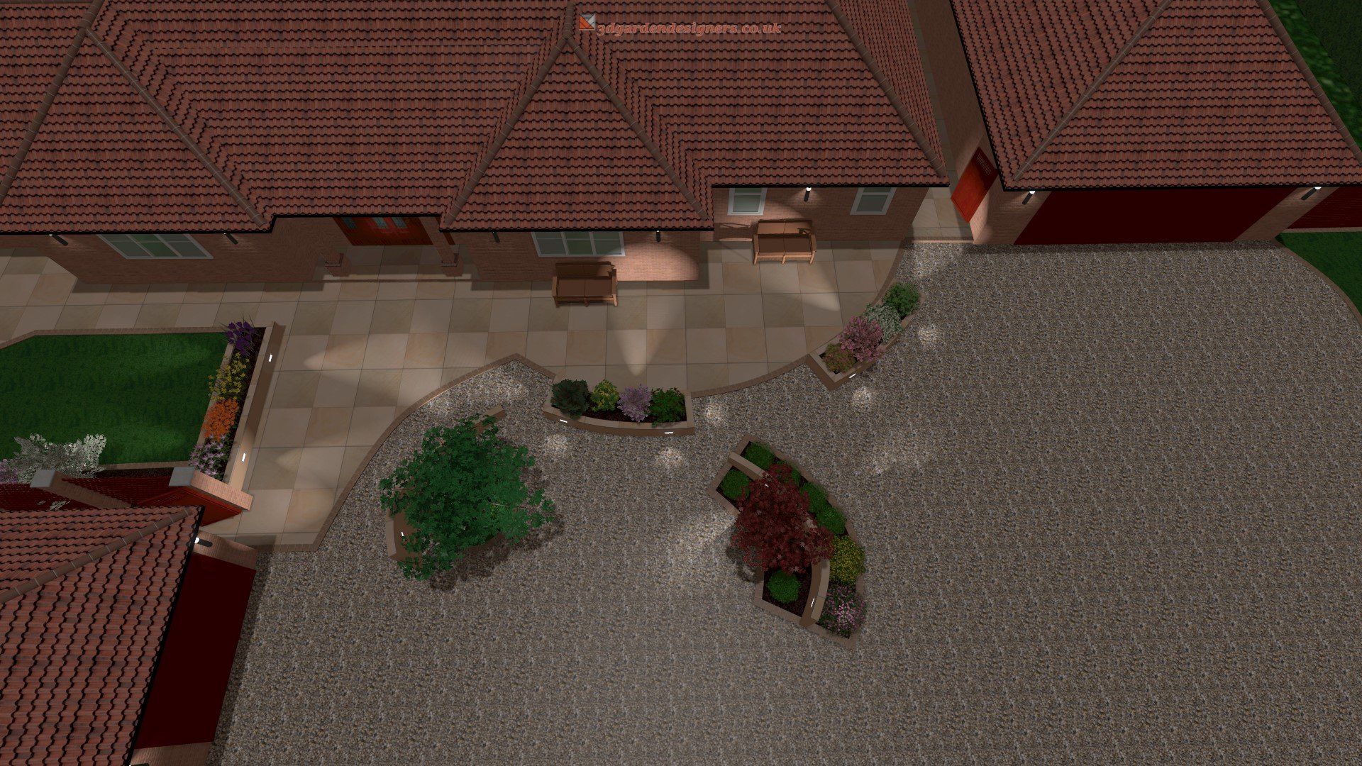 An aerial view of a house and driveway at night.