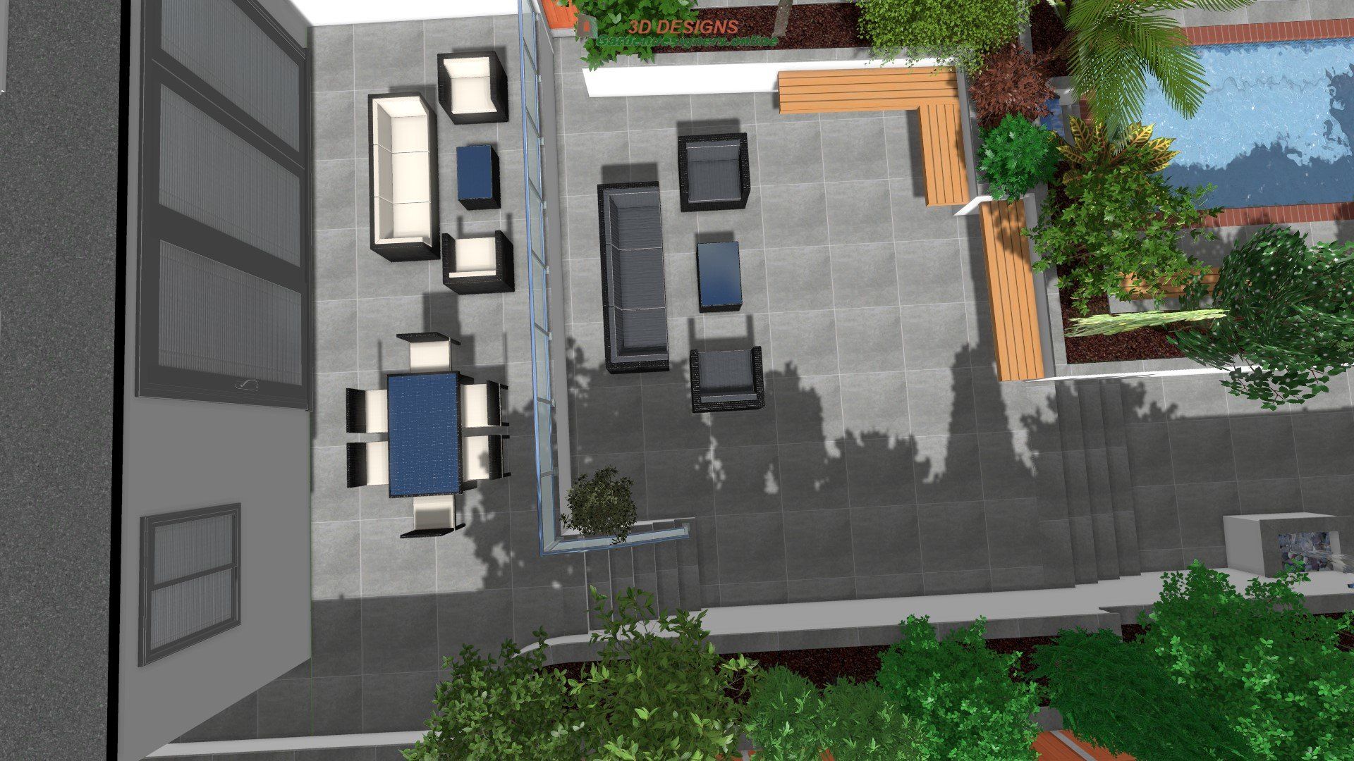 An aerial view of a patio with furniture and a pool