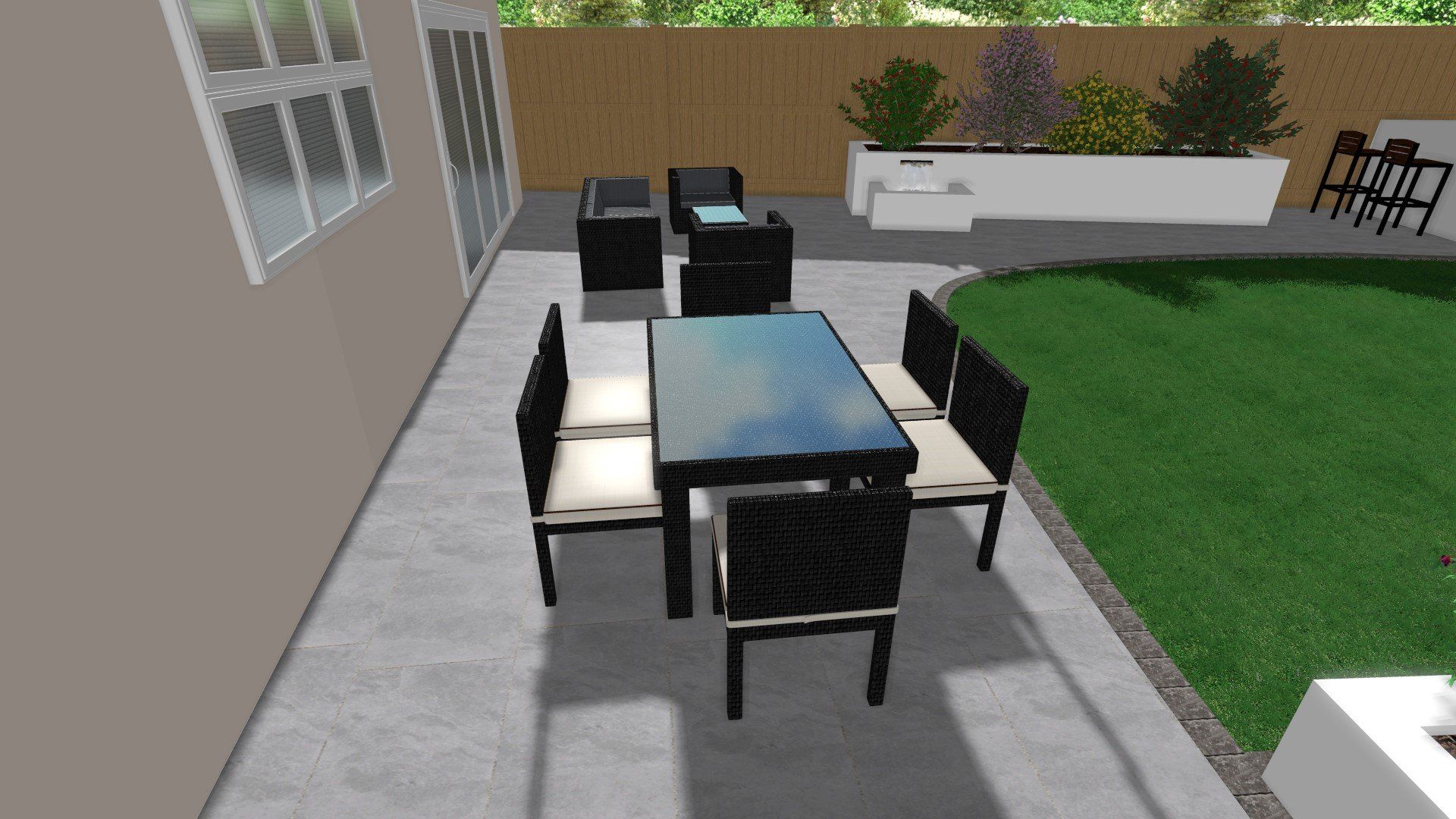 A computer generated image of a patio with a table and chairs.