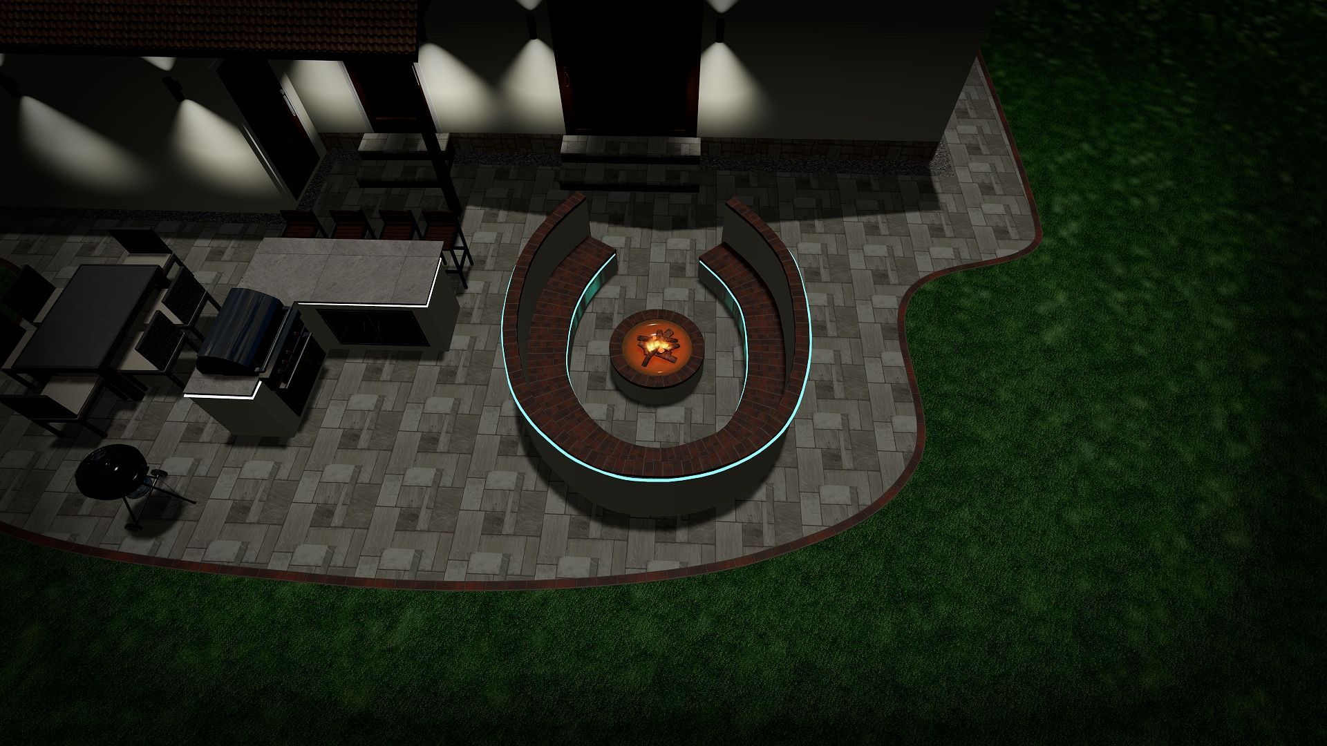 An aerial view of a fire pit on a patio at night.