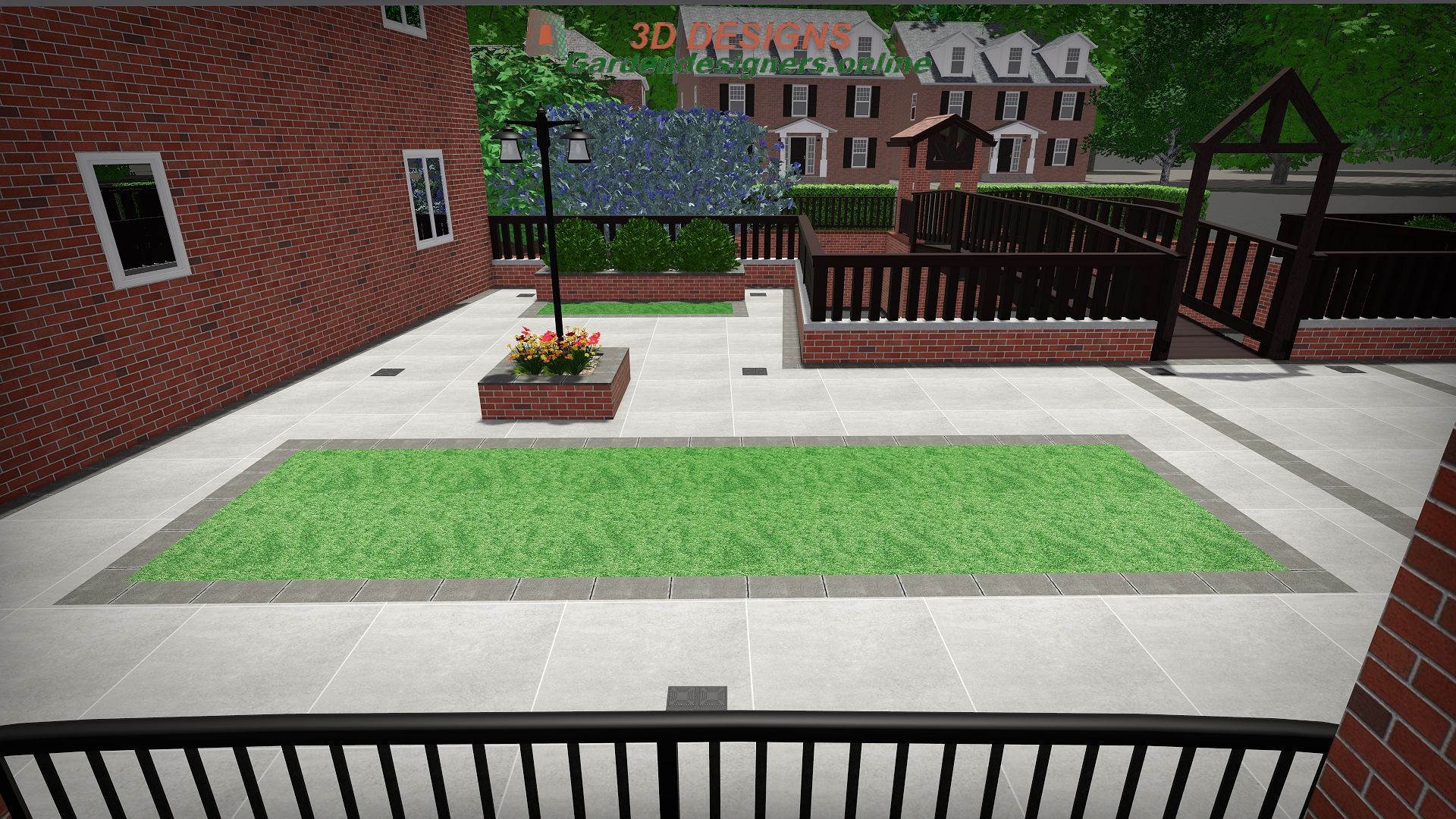 A brick building with a fence and a lawn in front of it.