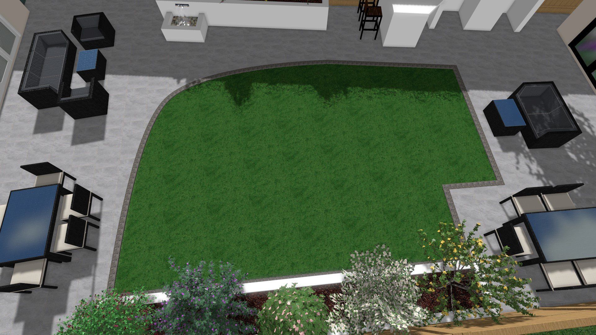 An aerial view of a lawn with tables and chairs