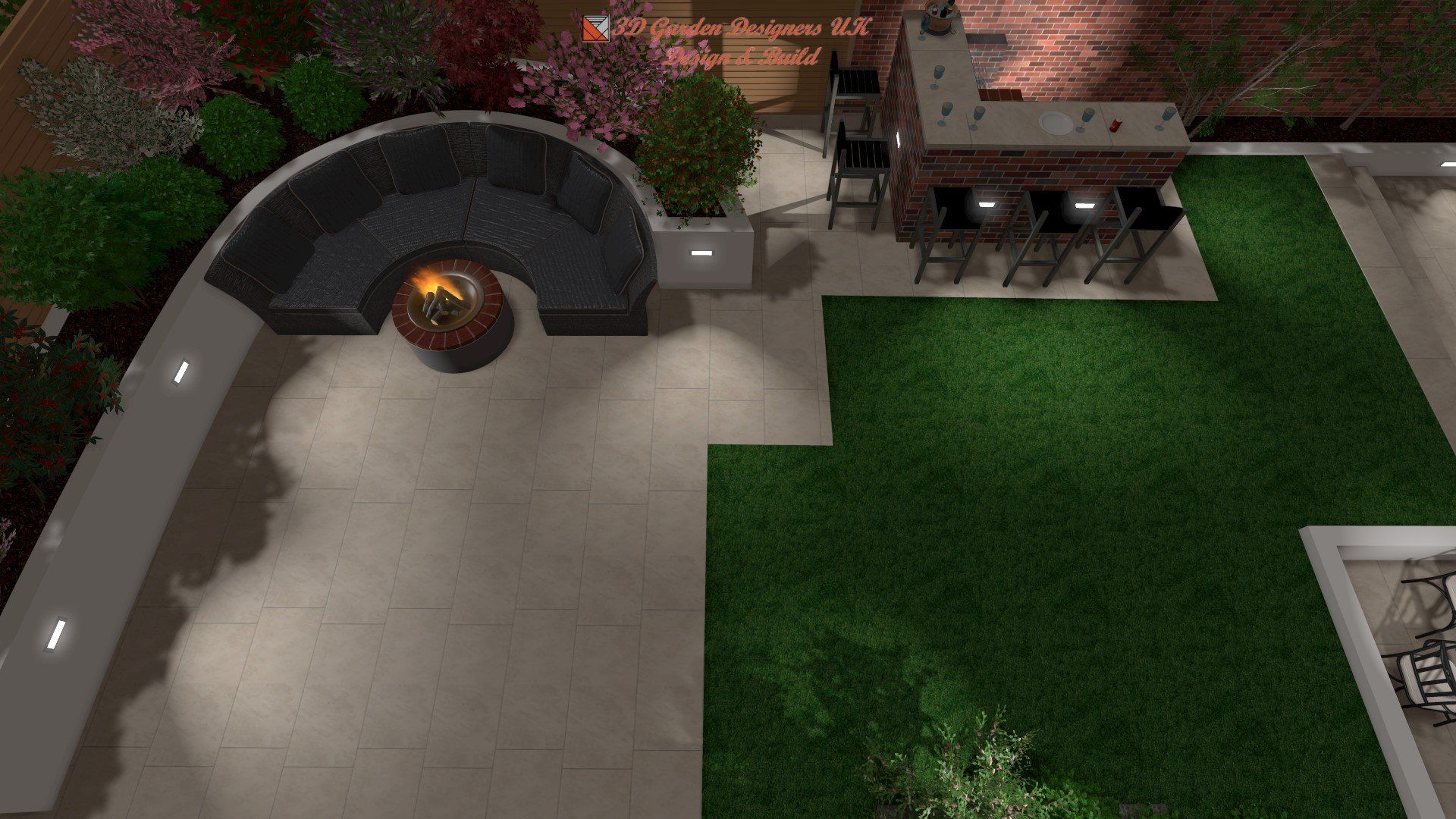 An aerial view of a patio with a fire pit and a couch.