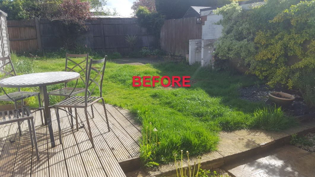 A before picture of a garden with a table and chairs.