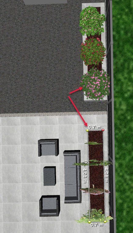 An aerial view of a patio with furniture and plants.