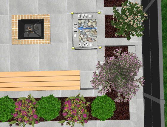 An aerial view of a garden with a bench and flowers