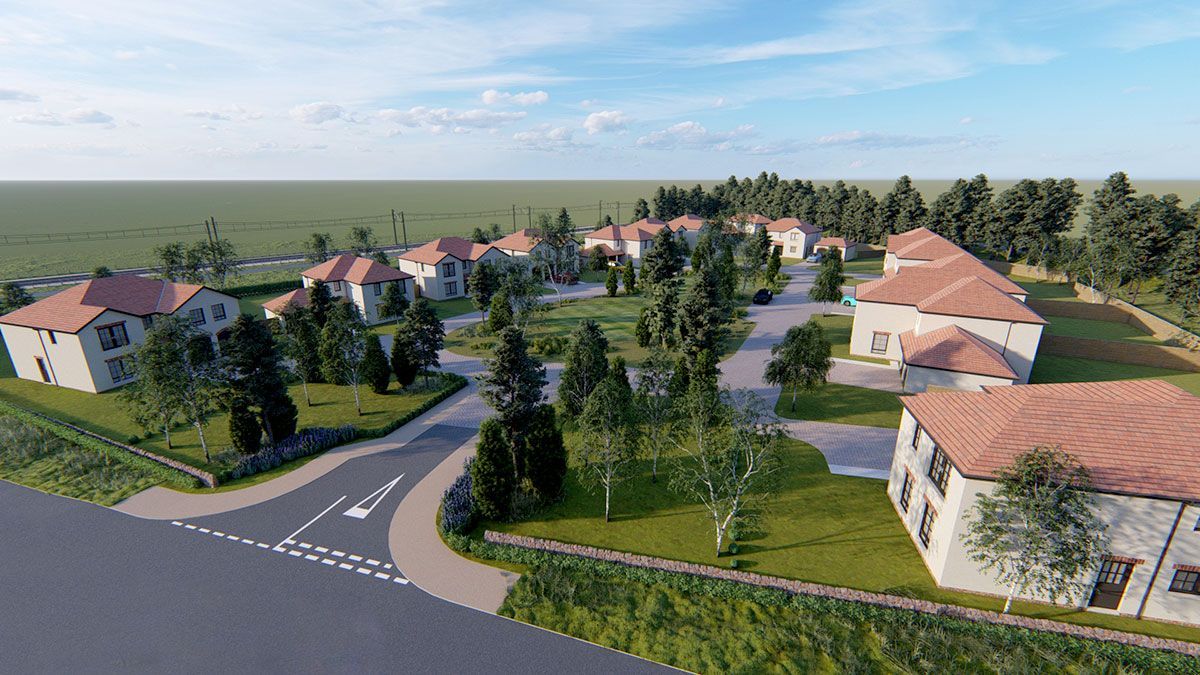 An aerial view of a residential area with houses and trees.
