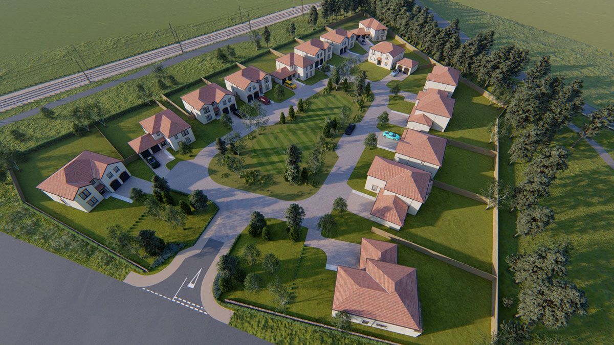 An aerial view of a residential area with lots of houses and trees.
