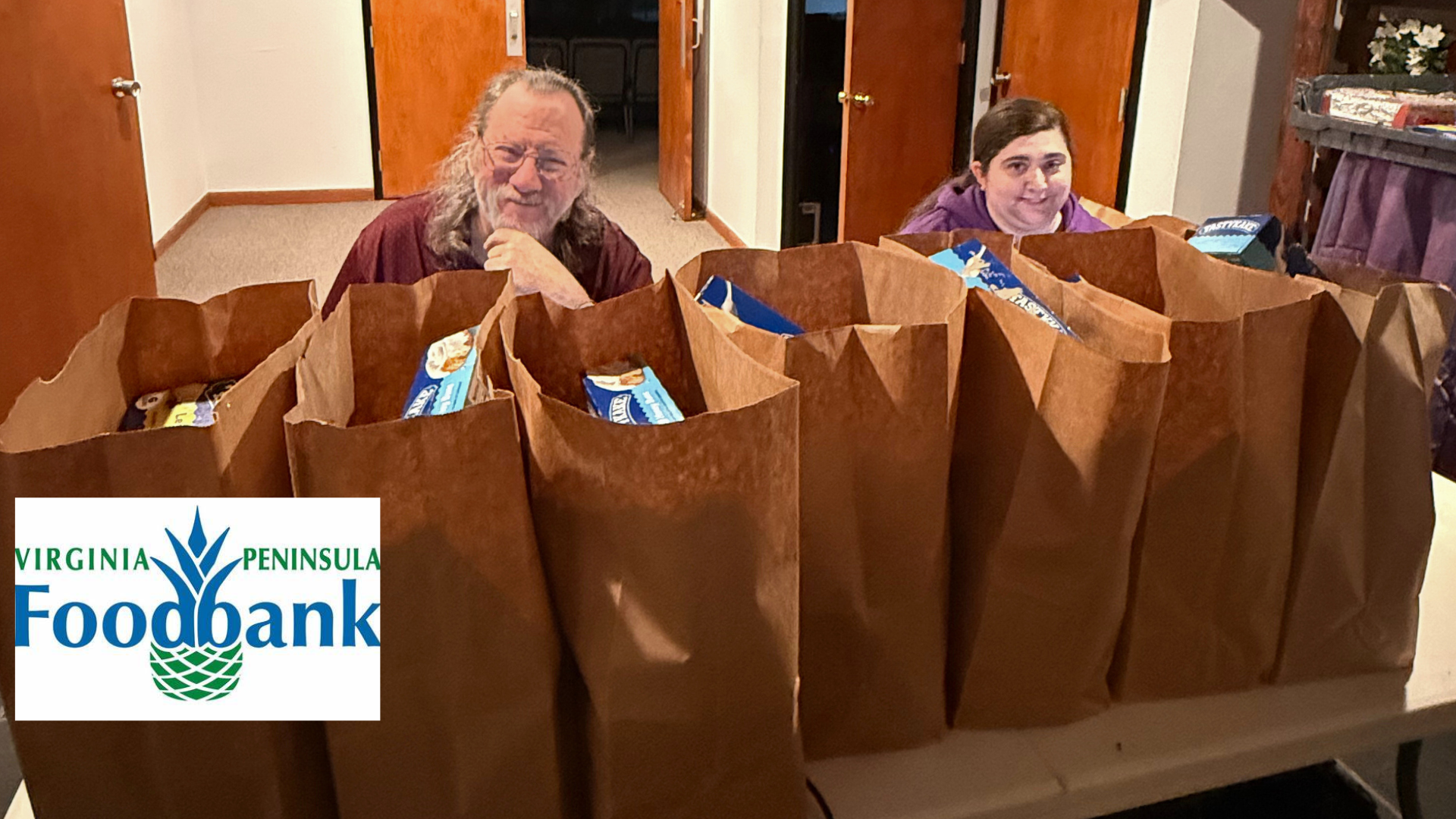 The logo for virginia peninsula foodbank is a pineapple.