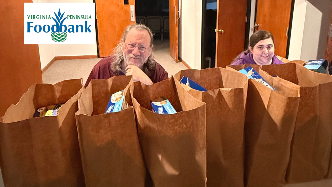 The logo for virginia peninsula foodbank is a pineapple.