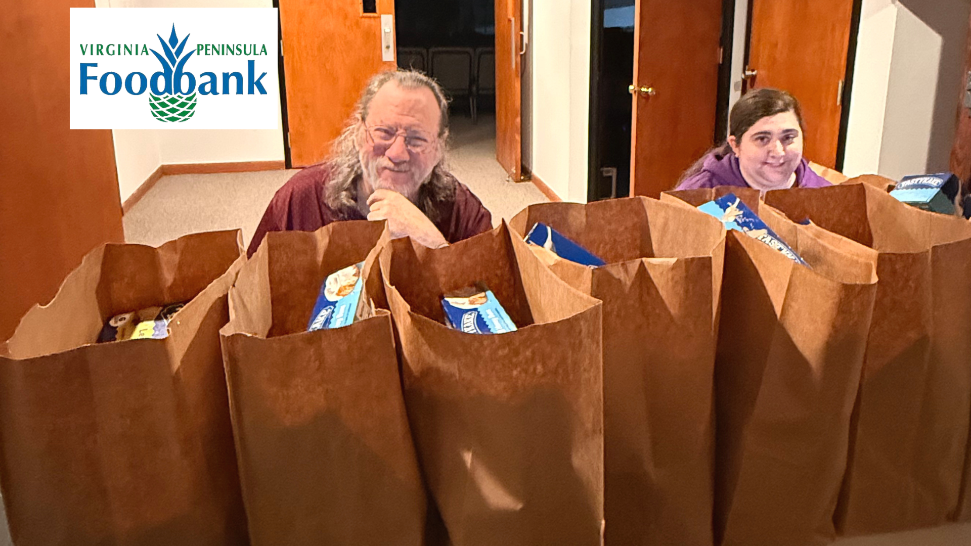 The logo for virginia peninsula foodbank is a pineapple.