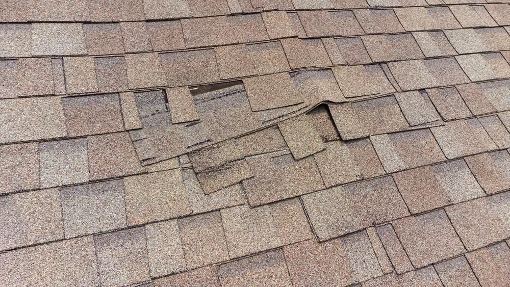 a close up of a roof with a hole in it .