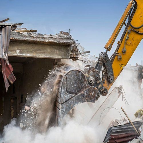 Putting Debris On The Truck — Bairnsdale, VIC — Sproule’s Demolition & Asbestos Removal