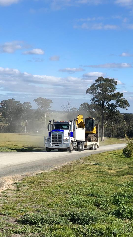Truck With A Machine — Bairnsdale, VIC — Sproule’s Demolition & Asbestos Removal