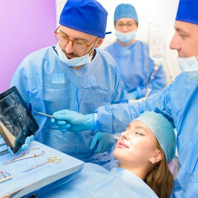Root Canals — Dentist Checking Xray in Modesto, CA