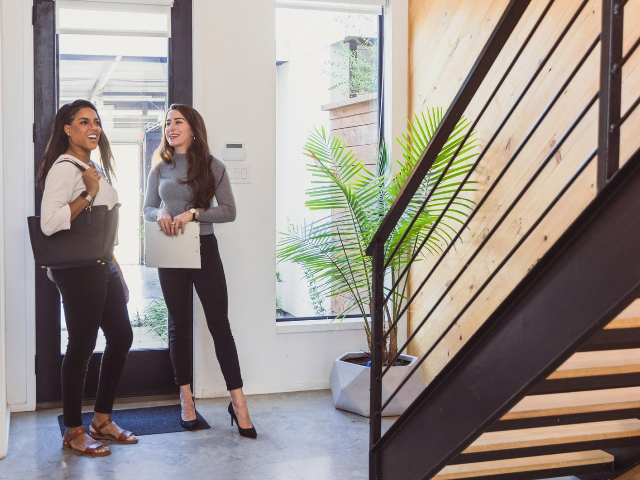 Real estate agent talking to a client