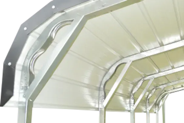 A close up of a metal structure with a white roof.