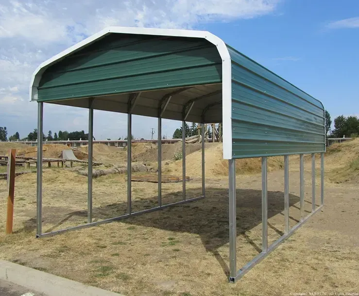 a carport with a green roof and white trim