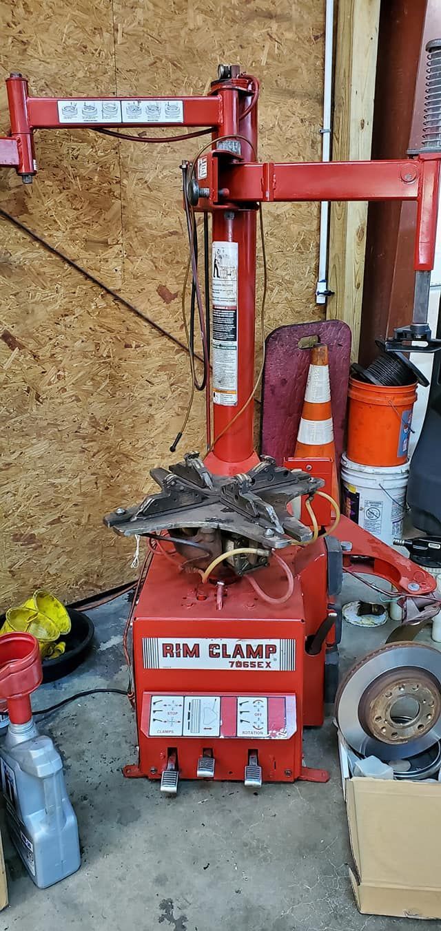 Professional Tire Mounting And Balancing Equipment In Auto Shop | More 4 Less Autorepair LLC