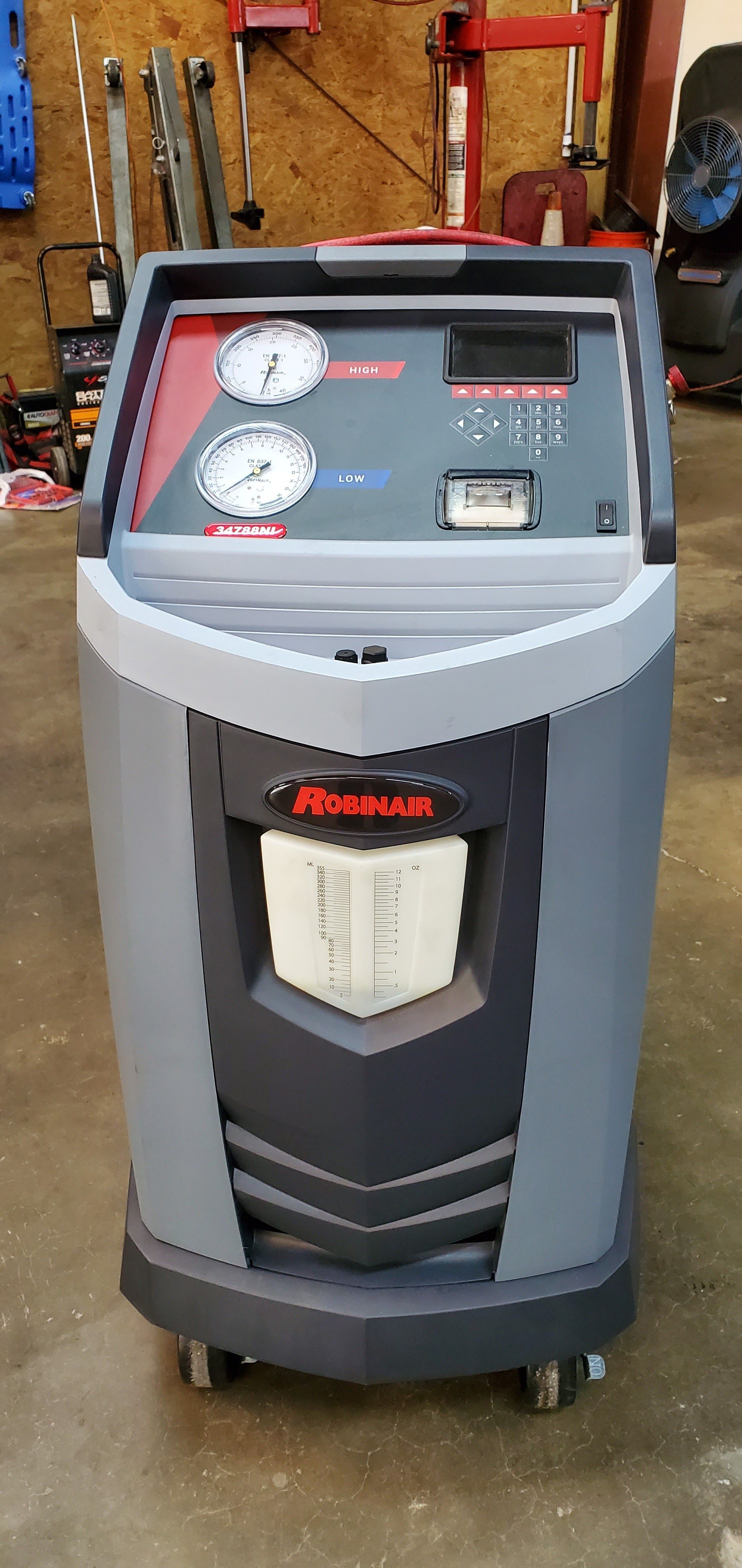 Automotive AC Recharge And Air Conditioning Service Machine In Shop | More 4 Less Autorepair LLC