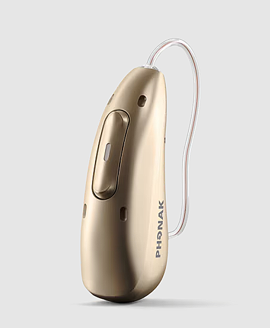 A phonak hearing aid is sitting on a white surface.