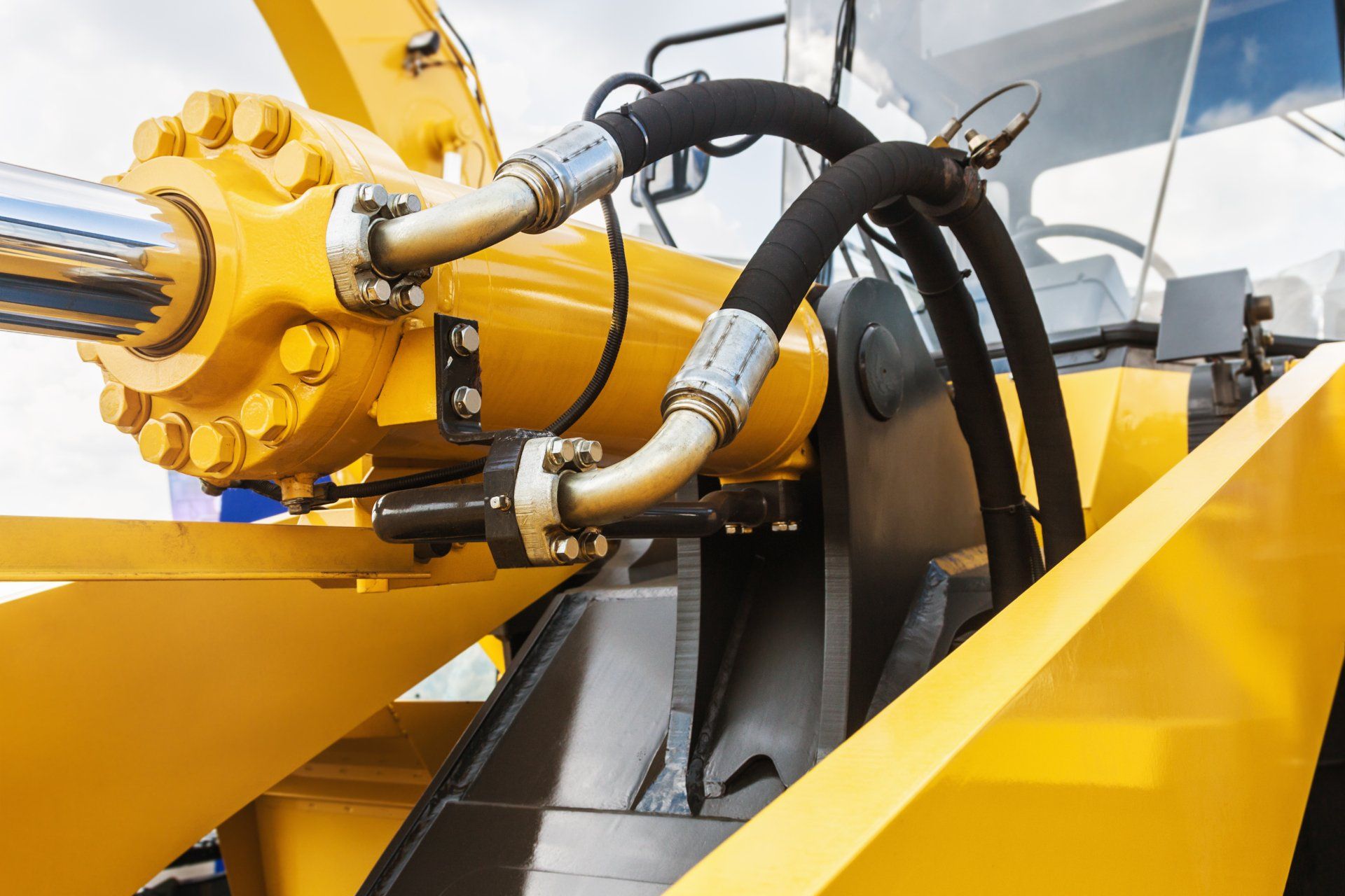 hydraulics tractor yellow focus on hydraulic