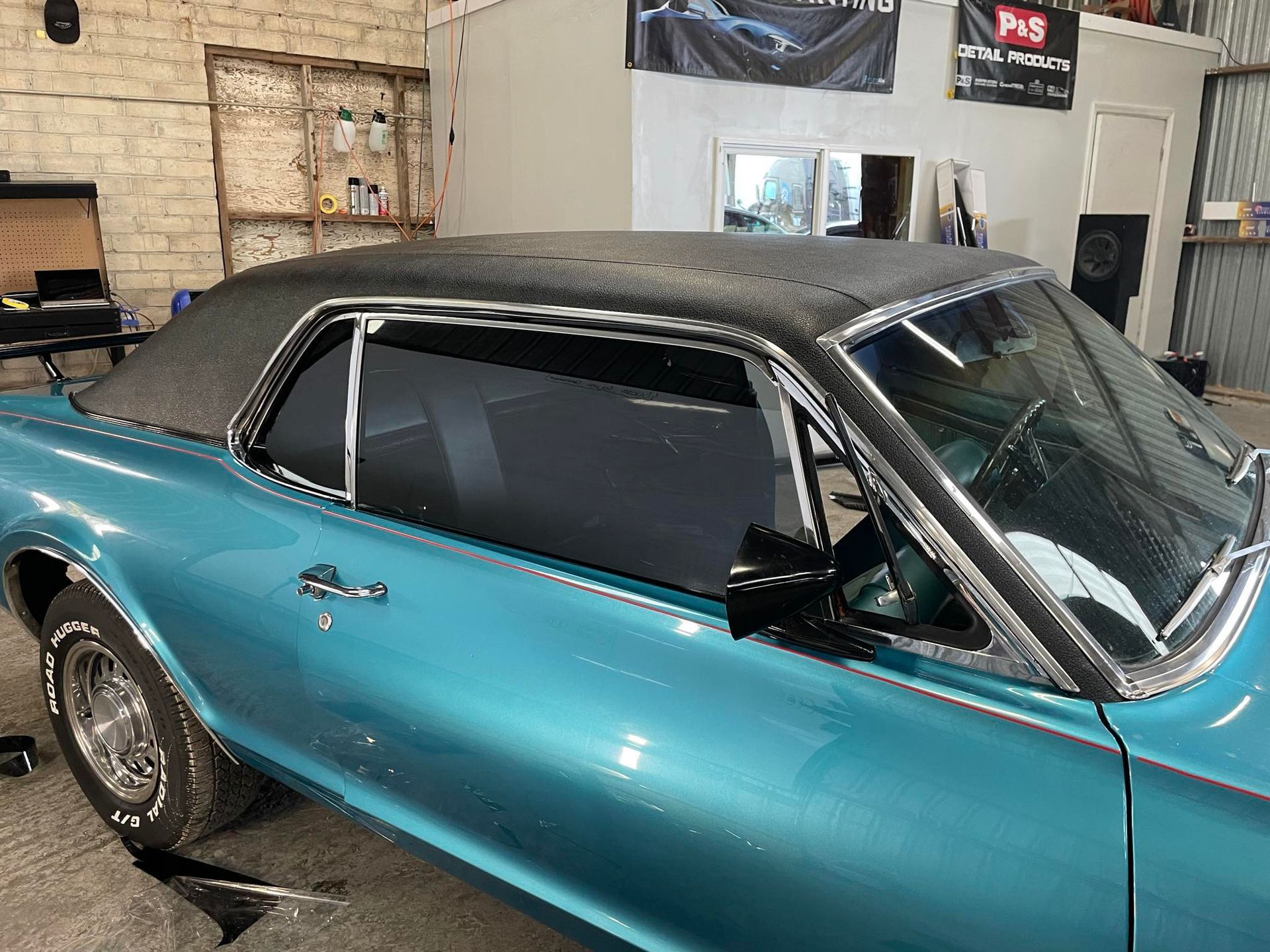 A toyota tundra is parked in a driveway next to a house.