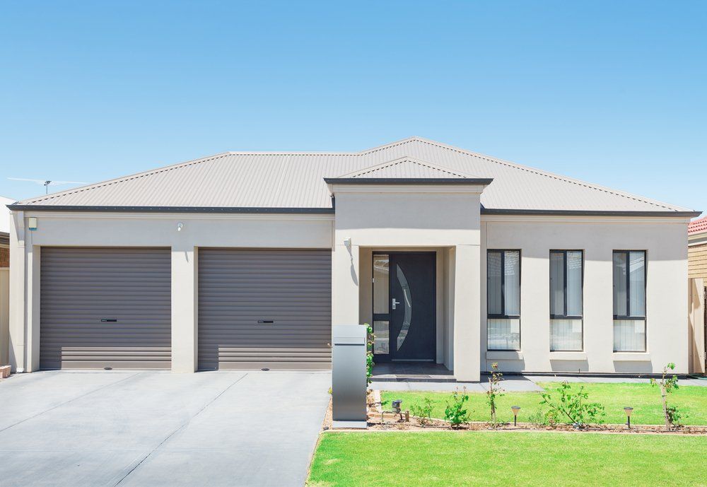Front View Of Modern House — Plumber in Garbutt, QLD