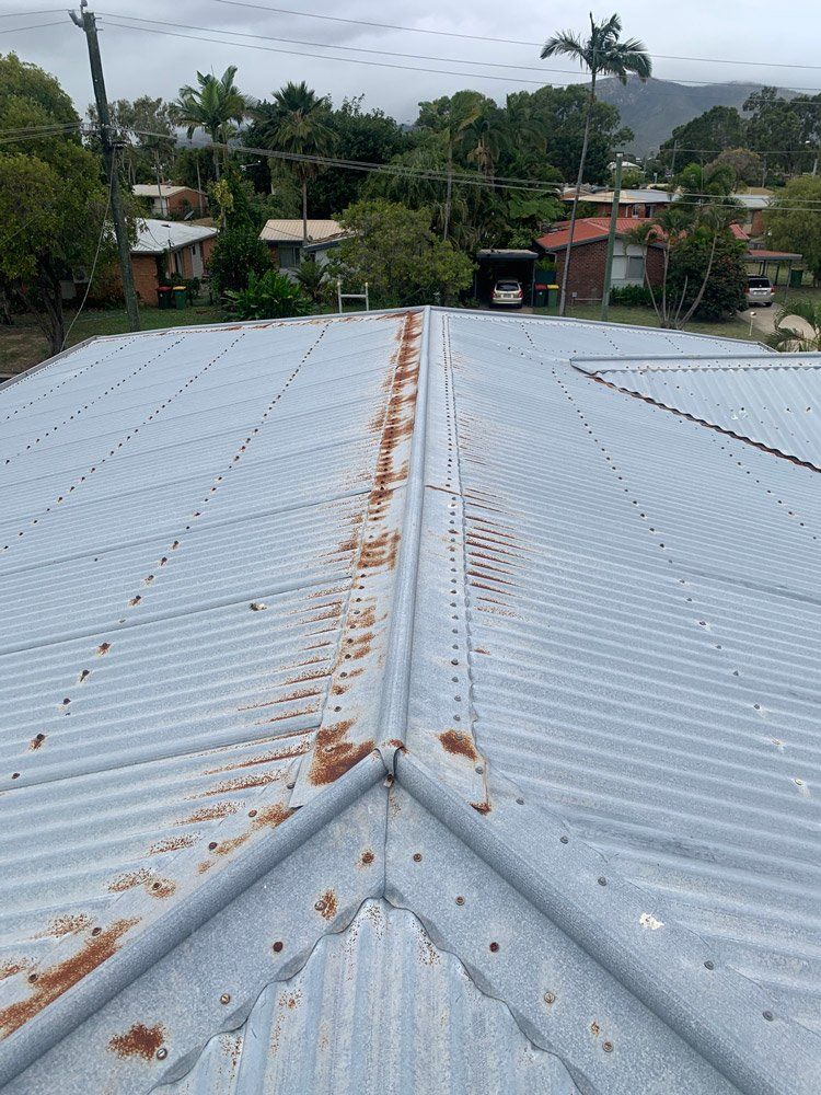 Uncoated Tin Roof With Rust Spots — Top To Bottom Plumbing