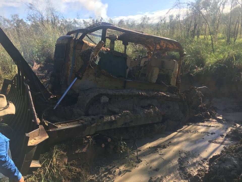 bulldozer stuck in mud