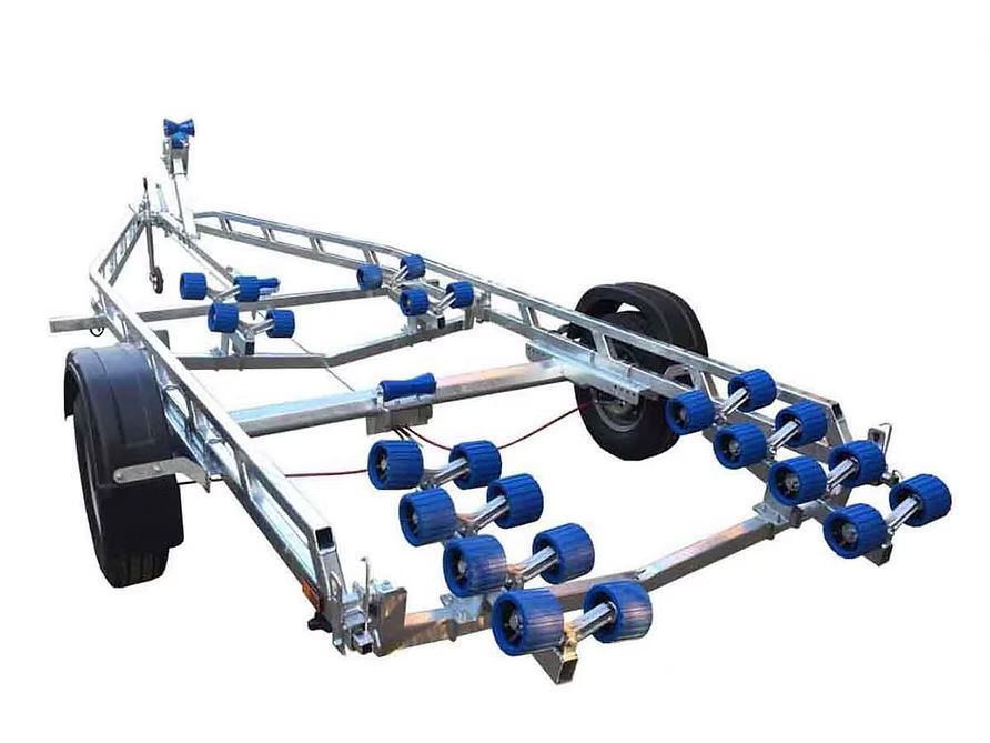 Boat trailer with blue rollers, gray frame, and black tires.