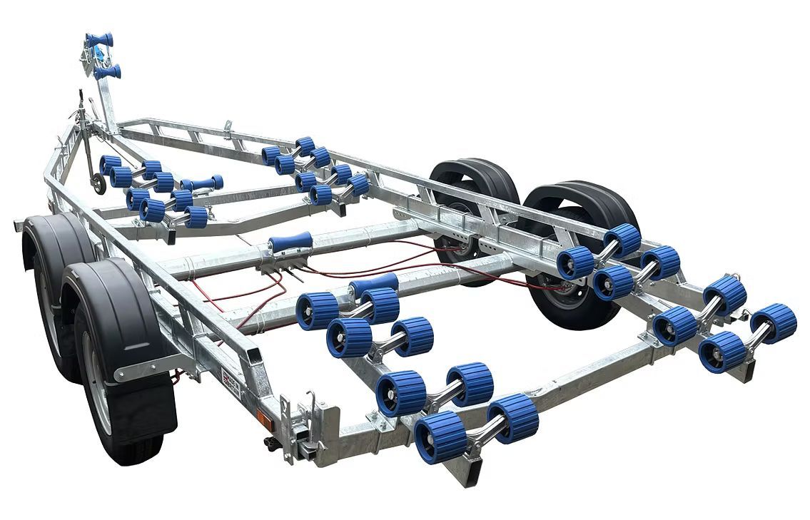 Boat trailer with multiple blue rollers and two axles, on a white background.