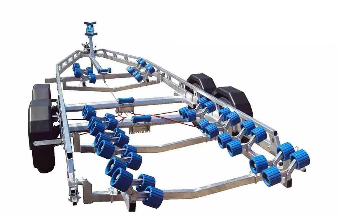 Boat trailer with numerous blue rollers and black tires.