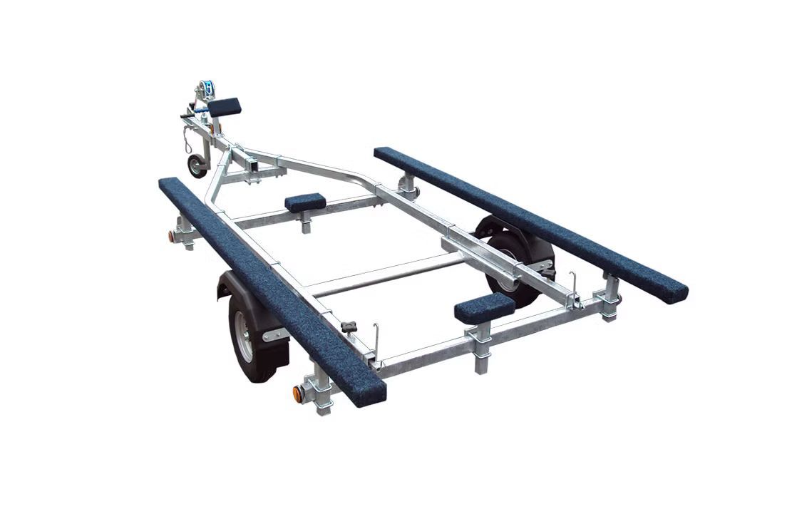 Boat trailer, metallic frame, blue padded runners, winch, wheels.