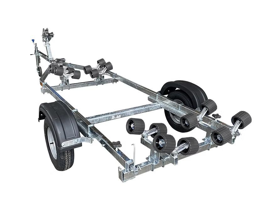 Boat trailer with rollers and tires, isolated on white background.