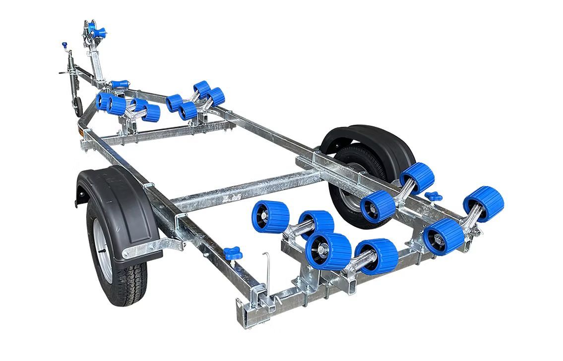 Boat trailer with blue rollers and a black tire.
