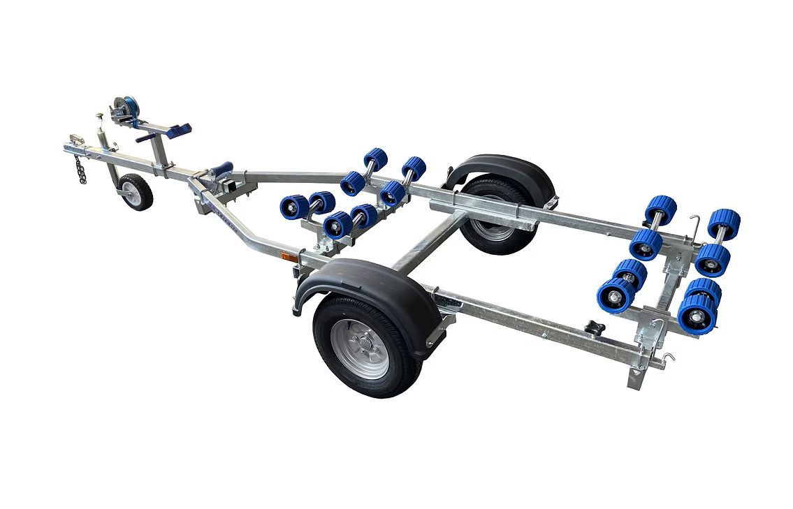 Boat trailer with blue rollers and two wheels.
