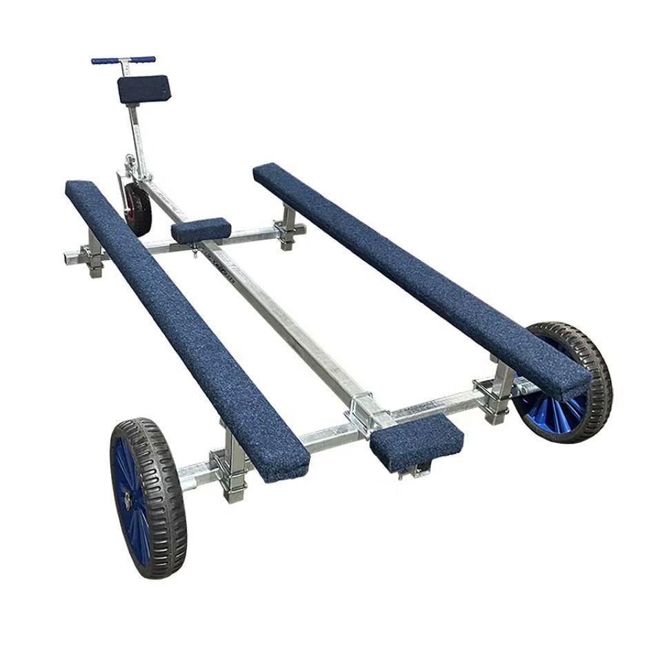 Boat launching dolly with blue padded rails, tires, and handle.