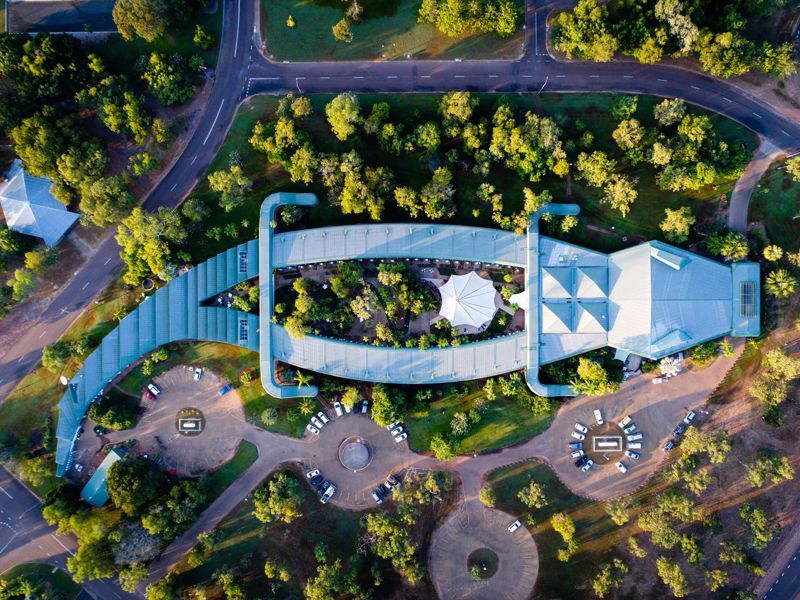 An aerial view of a building in the shape of a crocodile
