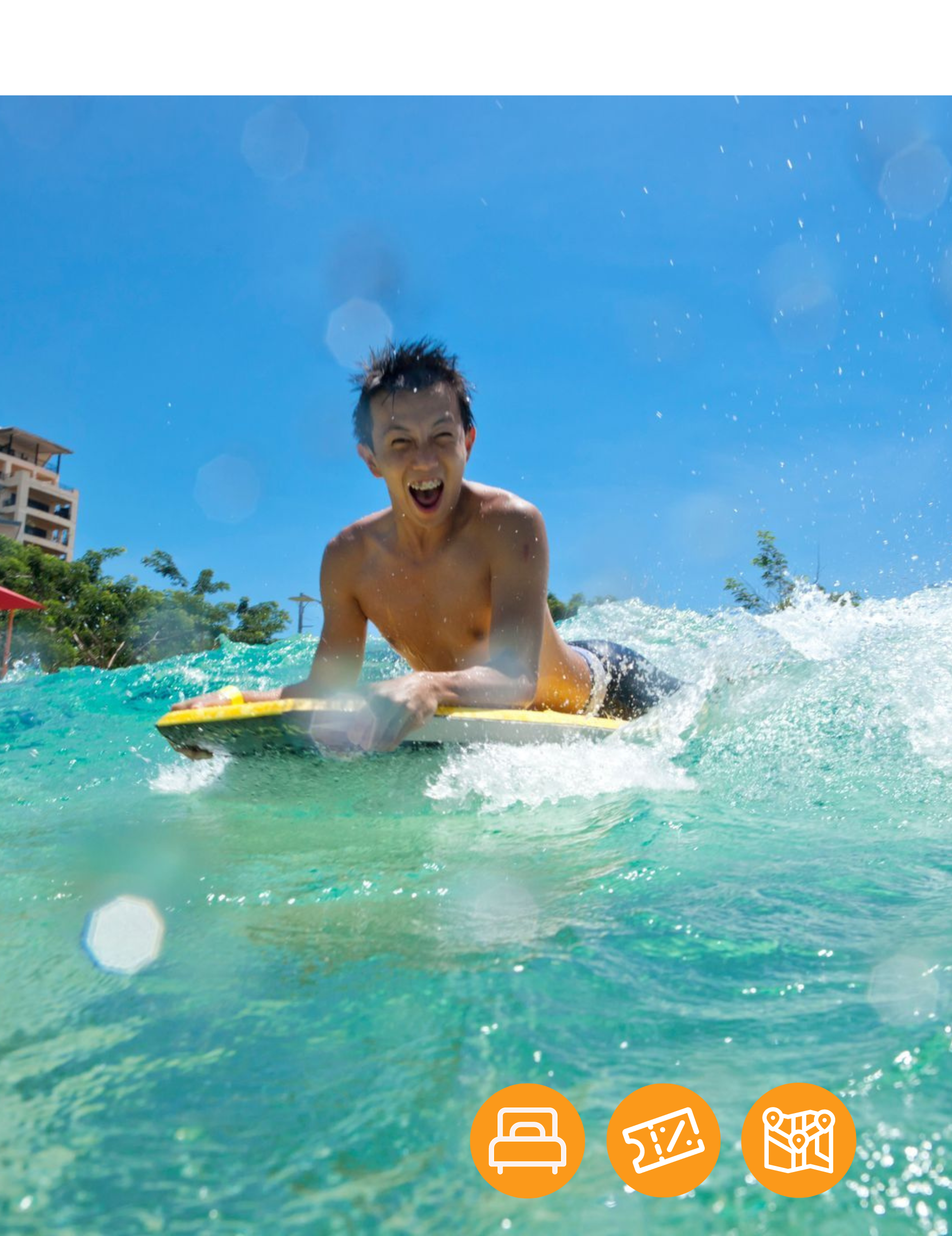 A man is riding a wave on a boogie board in the ocean.