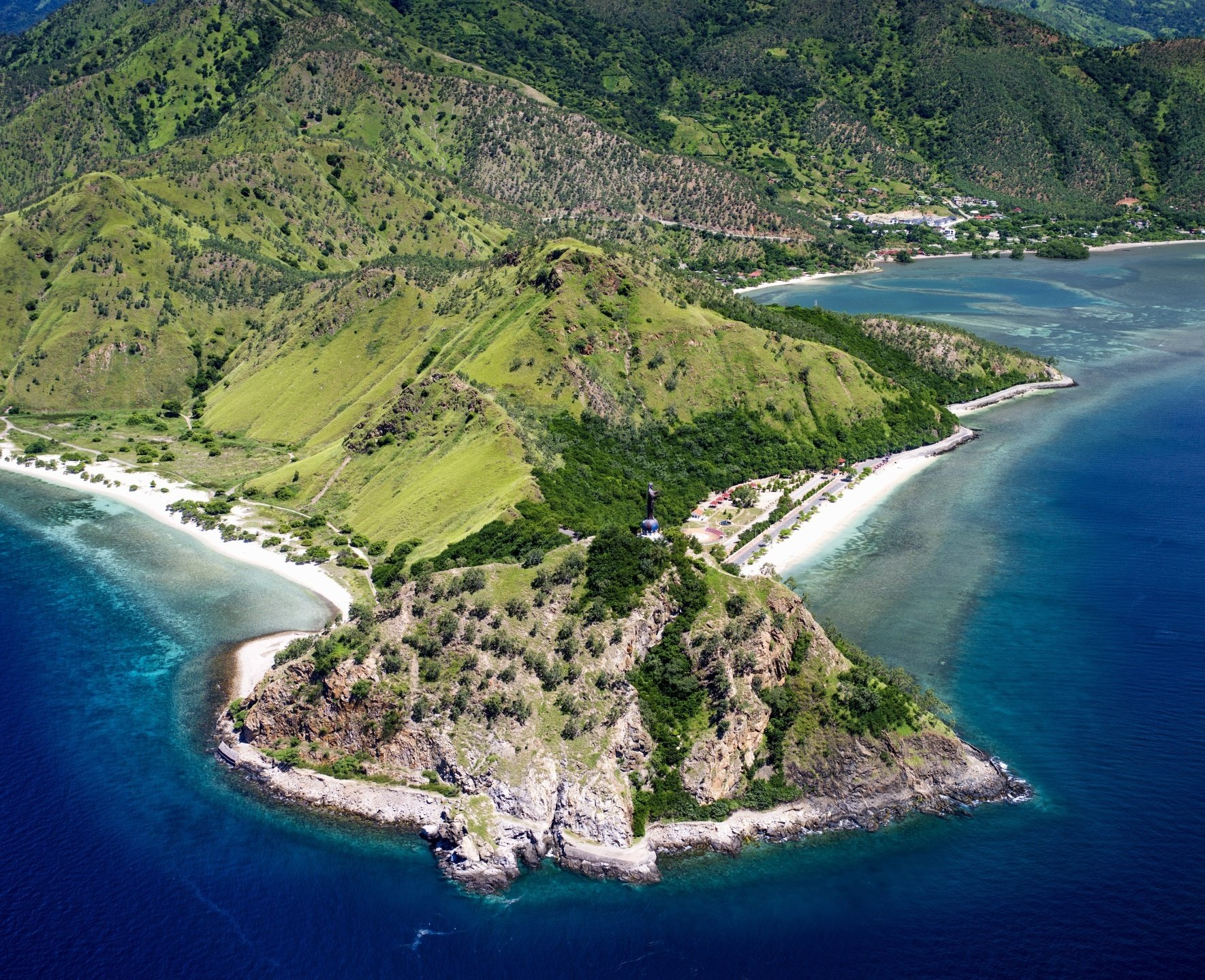 An aerial view of a small island in the middle of the ocean