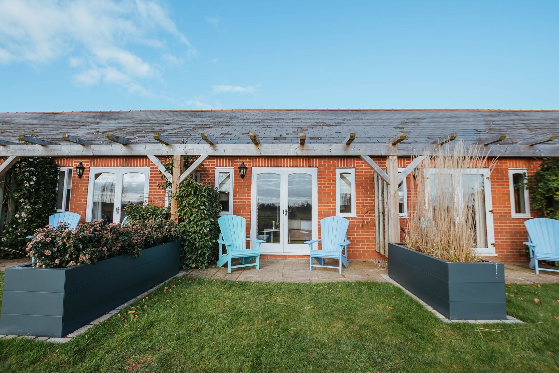 Deluxe room exterior at Three Choirs with private garden area, perfect for relaxing romantic getaways